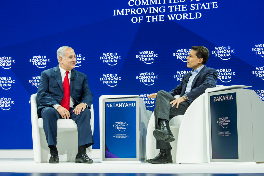 Premier Izraela Benjamin Netanyahu (z lewej) podczas Światowego Forum Ekonomicznego w Davos.